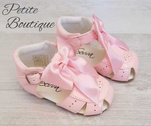 Pink bow patent sandals