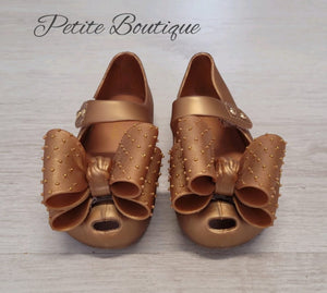 Gold jelly shoes