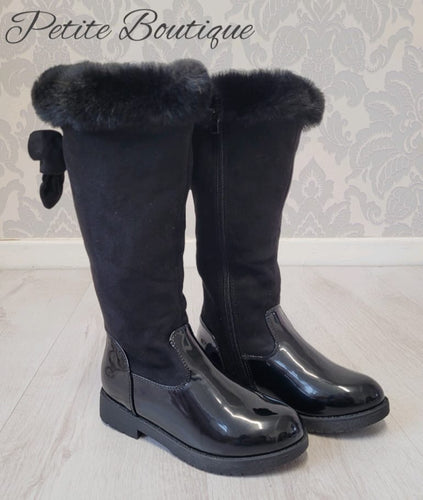 Black knee high boots with faux fur trim & bow at the back