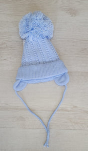 Cable knit pompom tie under hat