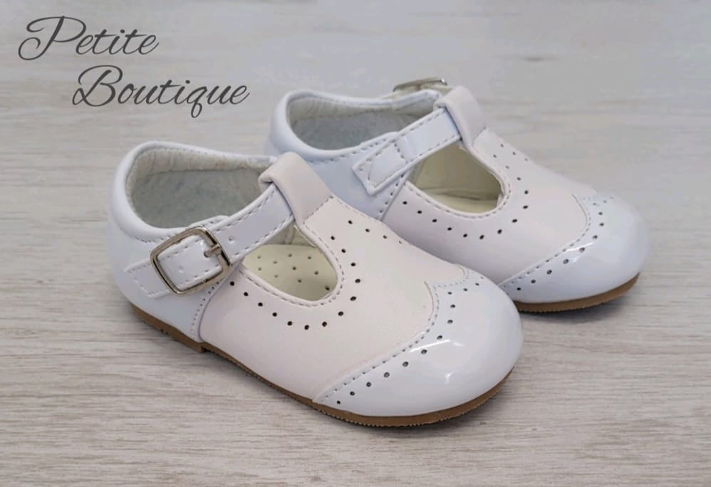 White patent brogue style t-bar shoes