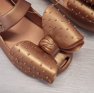 Gold jelly shoes