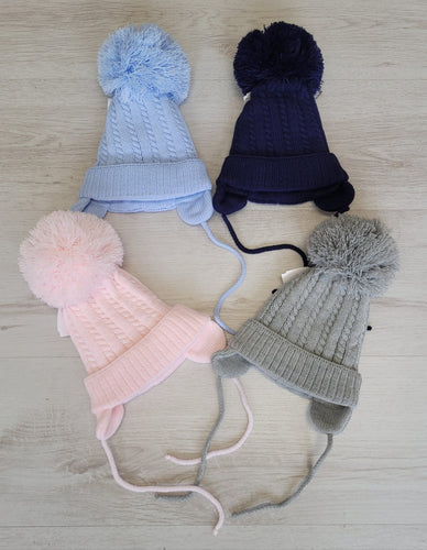 Cable knit pompom tie under hat