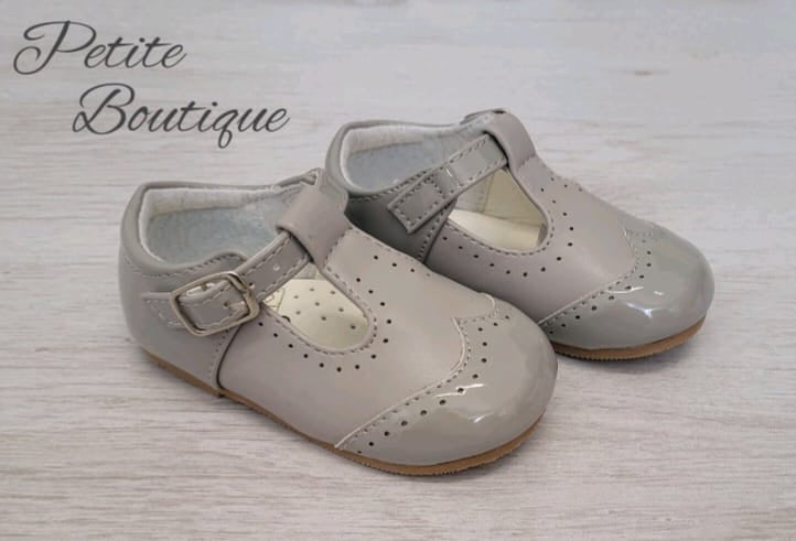 Grey patent brogue style t-bar shoes