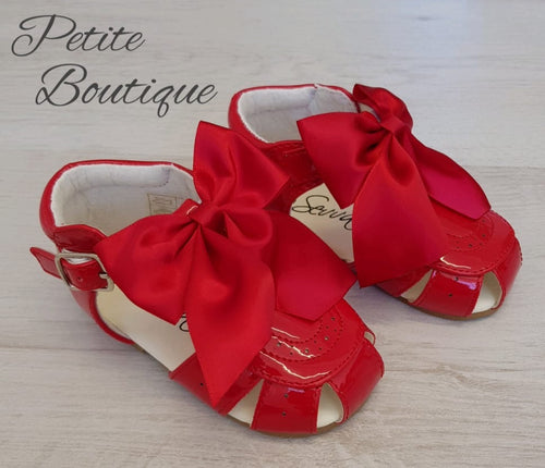 Red patent bow sandals