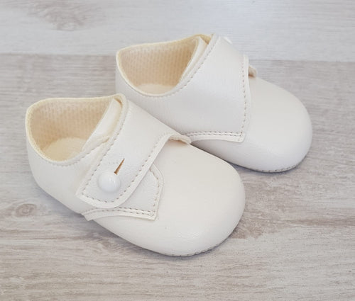 White matte button over soft sole shoes