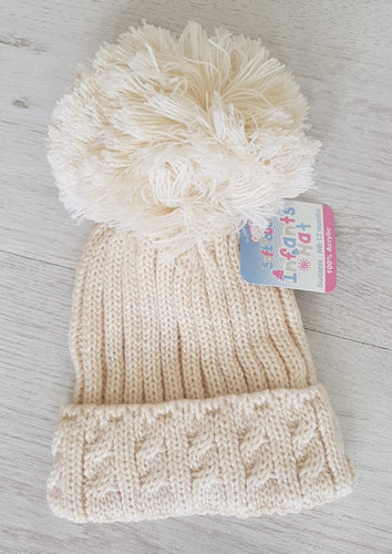 Beige pompom hat