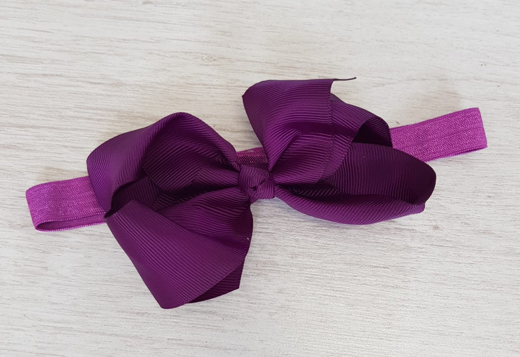 Dark purple bow