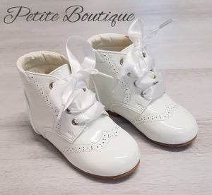 White patent lace boots