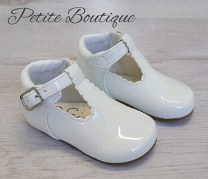 White patent t-bar shoes