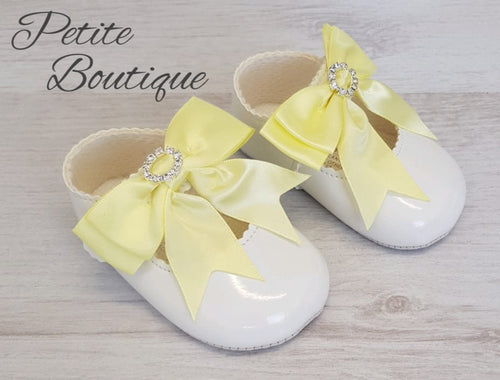 White patent lemon diamanté bow soft sole shoes