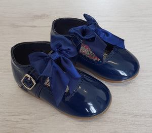 Navy patent bow shoes
