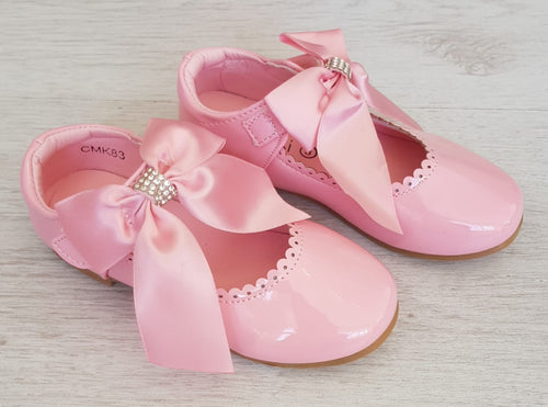 Pink patent ribbon shoes