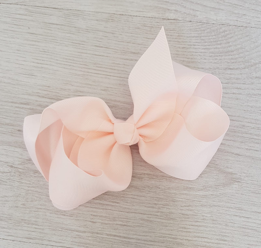 Pale pink hair bow