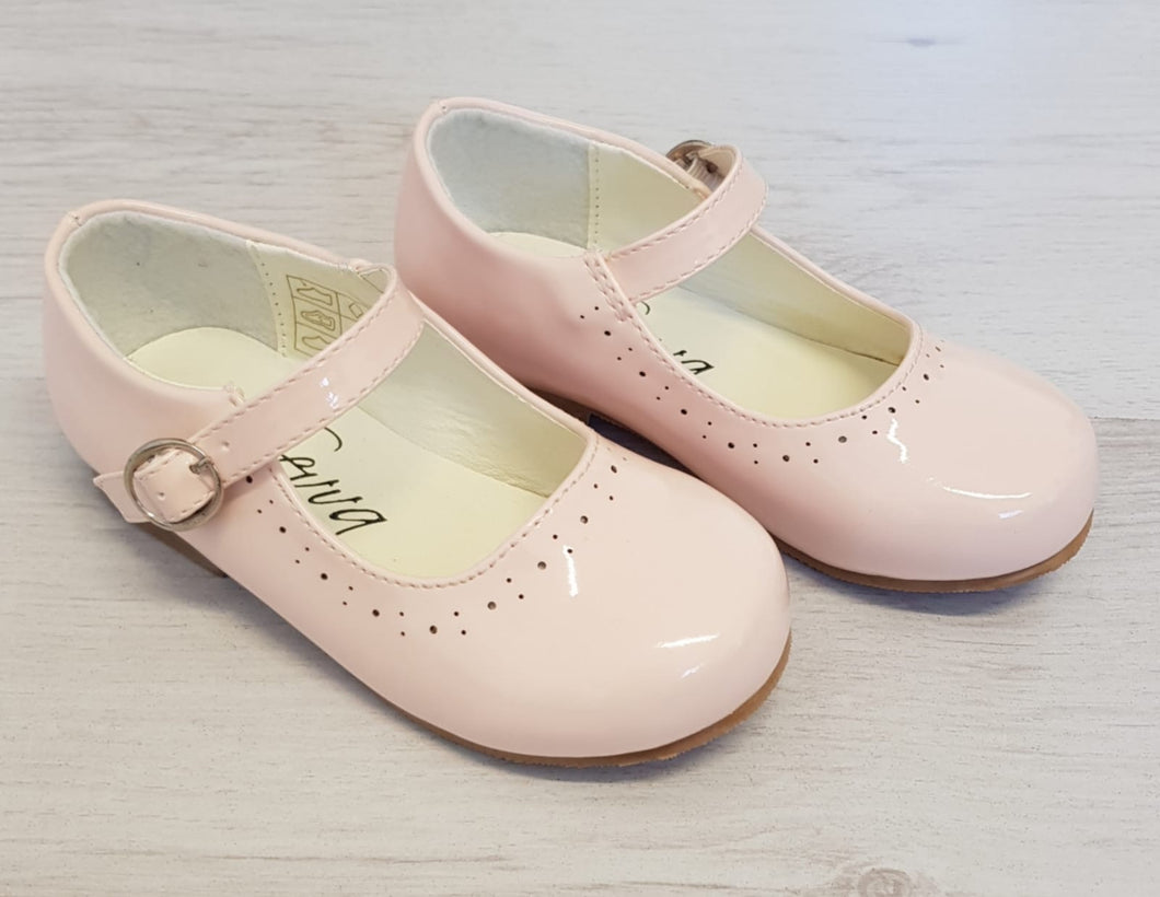 Pink patent shoes