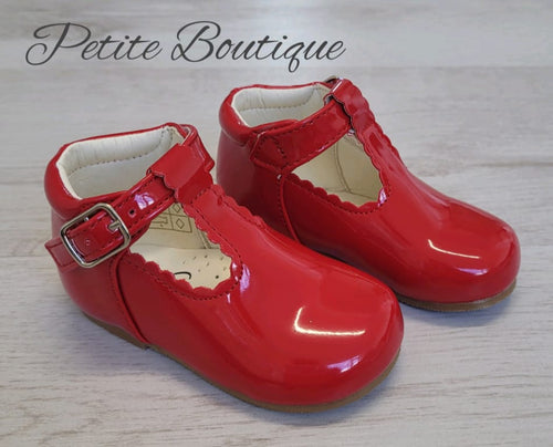 Red patent t-bar shoes