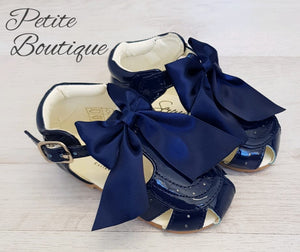 Navy patent bow sandals