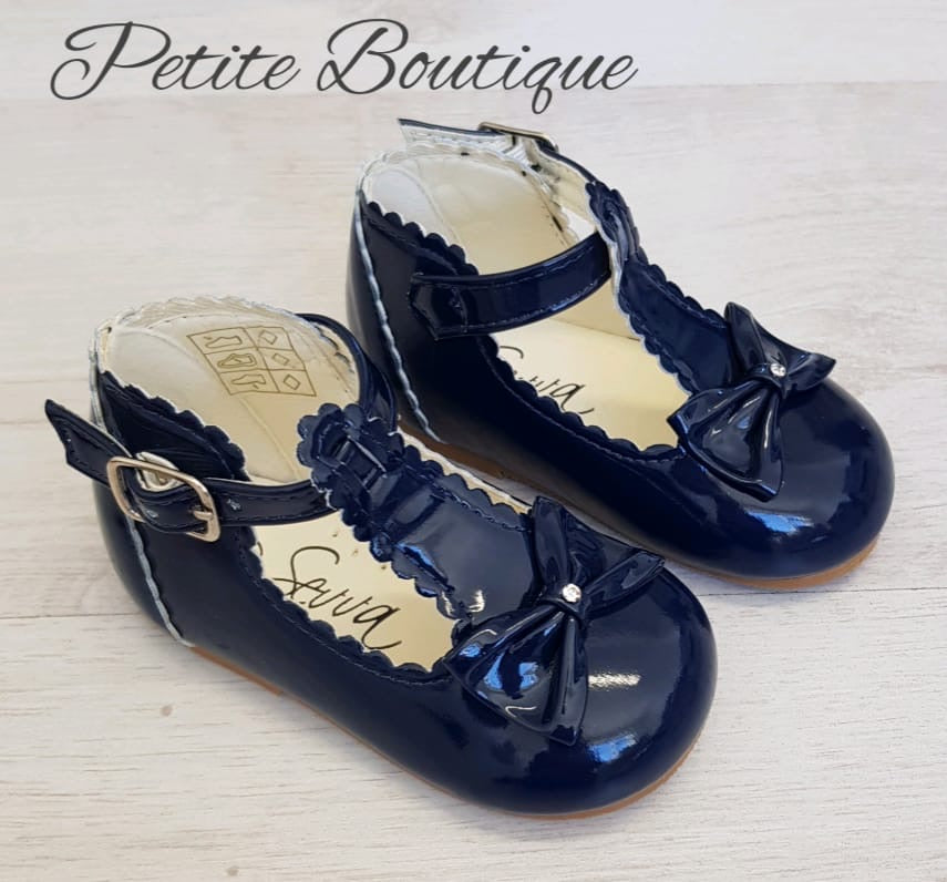 Navy patent t-bar bow shoes