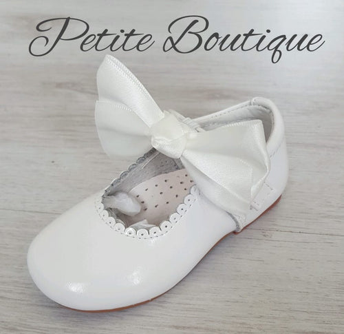 Spanish white patent leather shoes